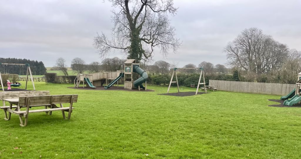 Pub garden at The Castle of Comfort with kids play area