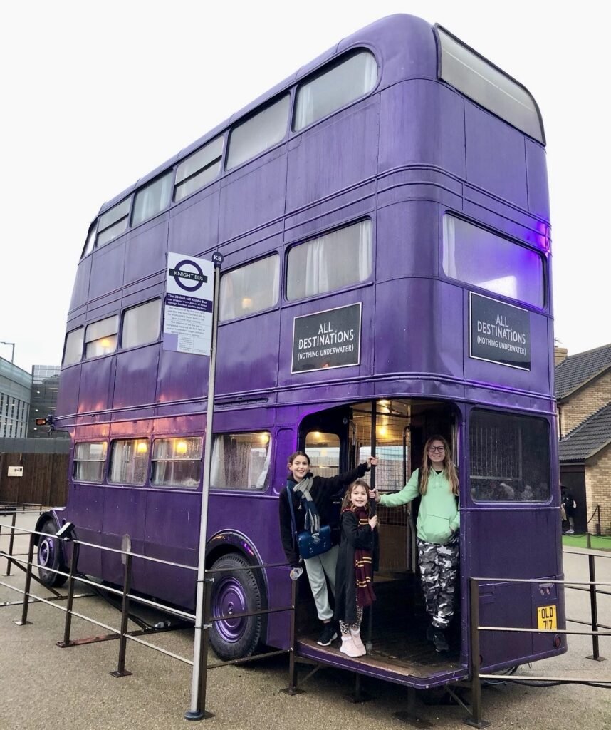 The purple Knight Bus photo opportunity at the Harry Potter Studio Tour London backlot