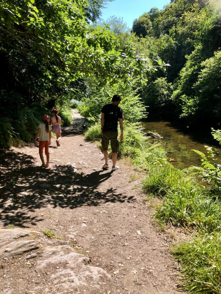 Walking along the River Barle at Tarr Steps, Somerset